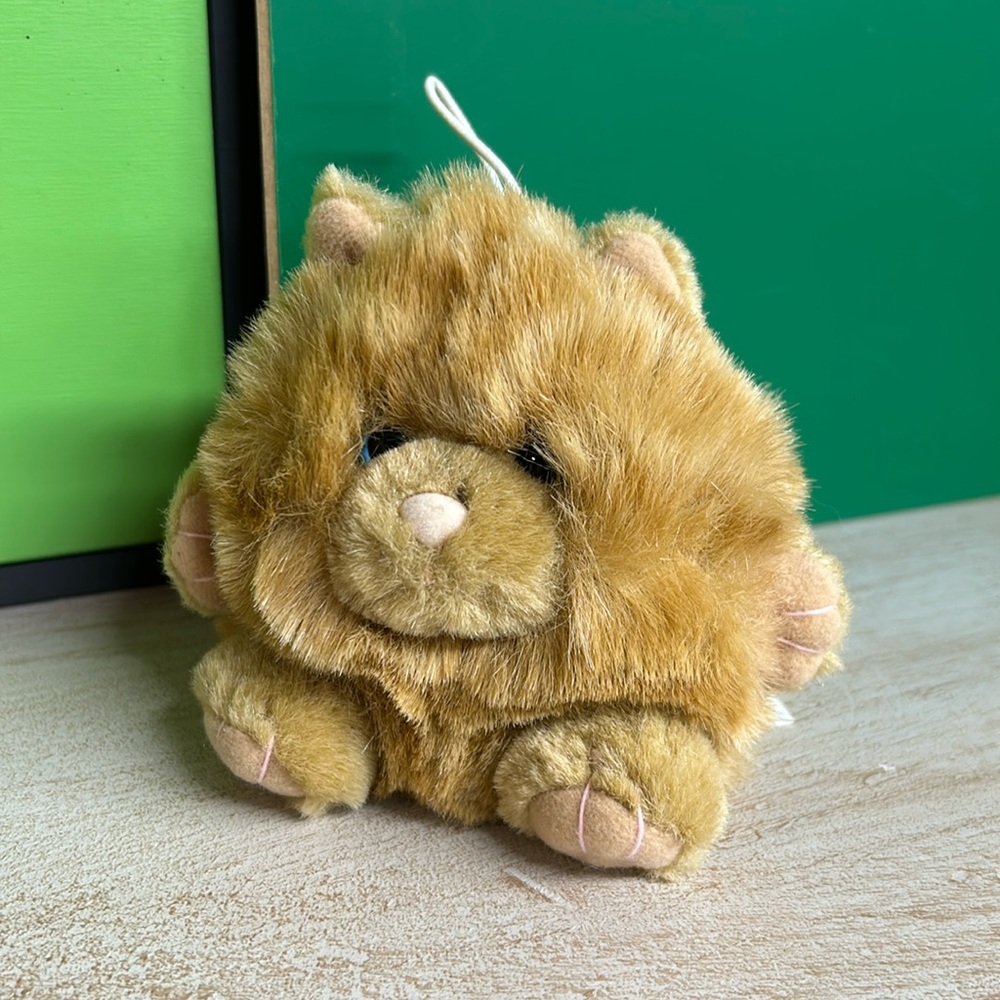 Puffy orange cat stuffie